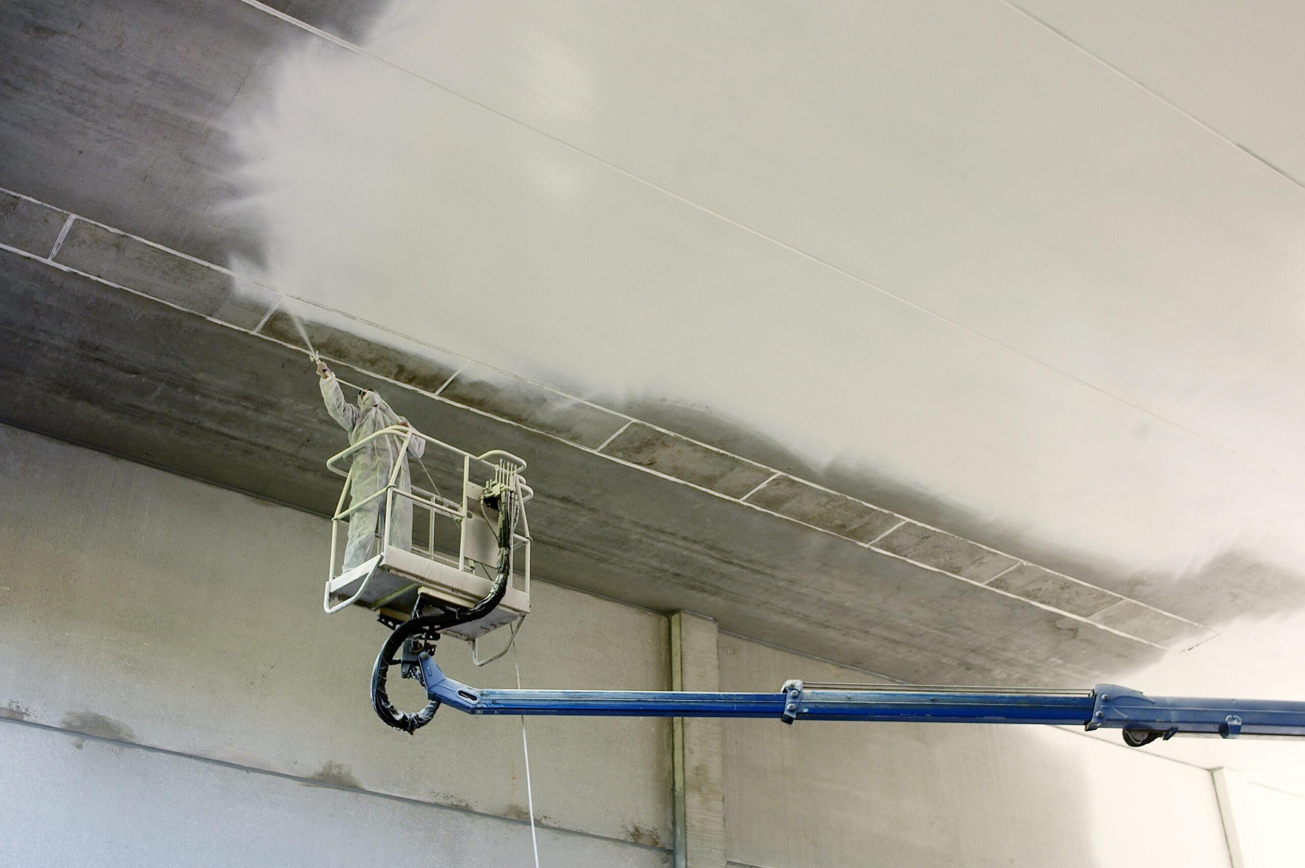 industrial coating estimator reviewing field work and production conditions