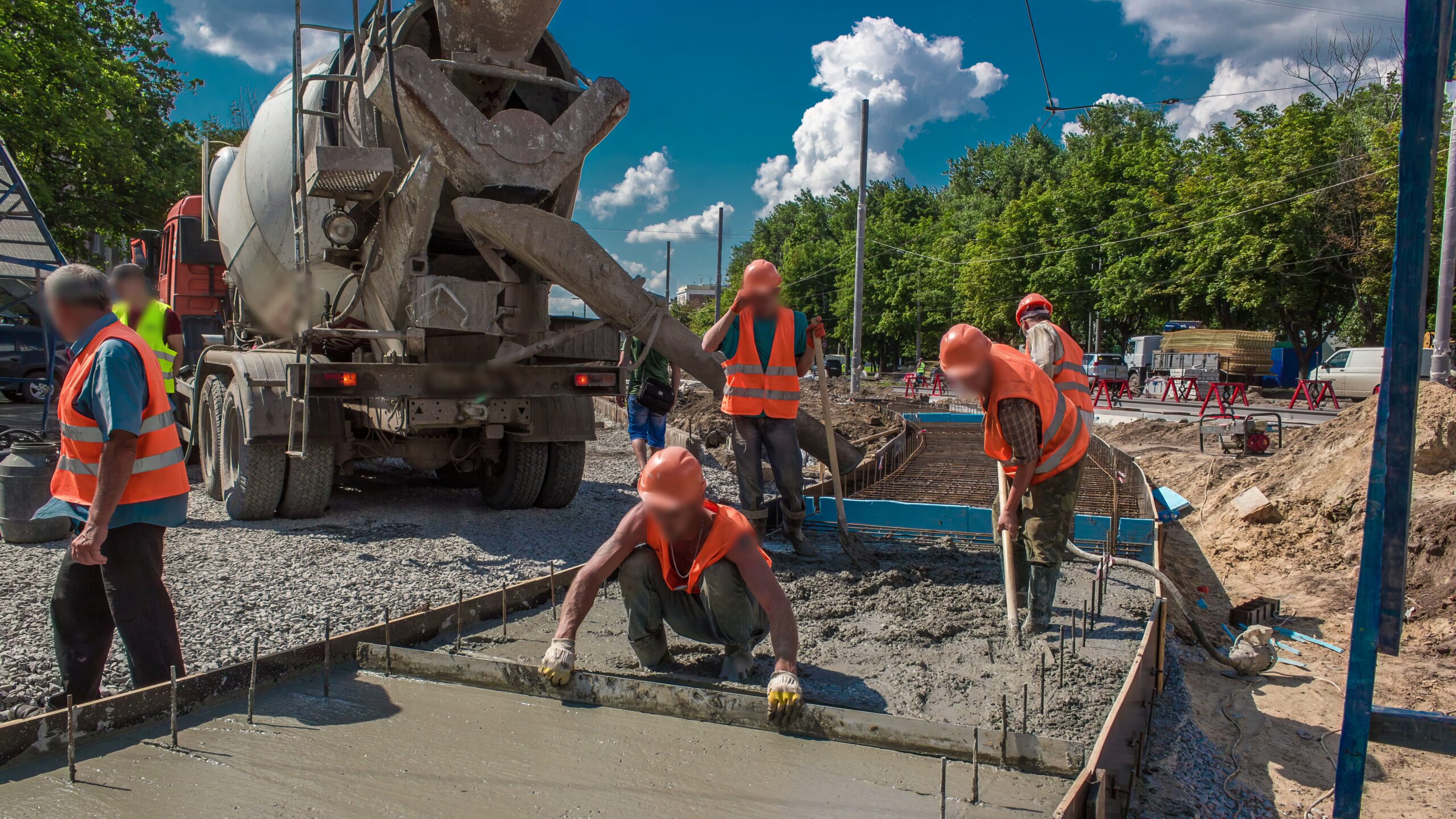 Municipal public works crew placing concrete on an infrastructure project