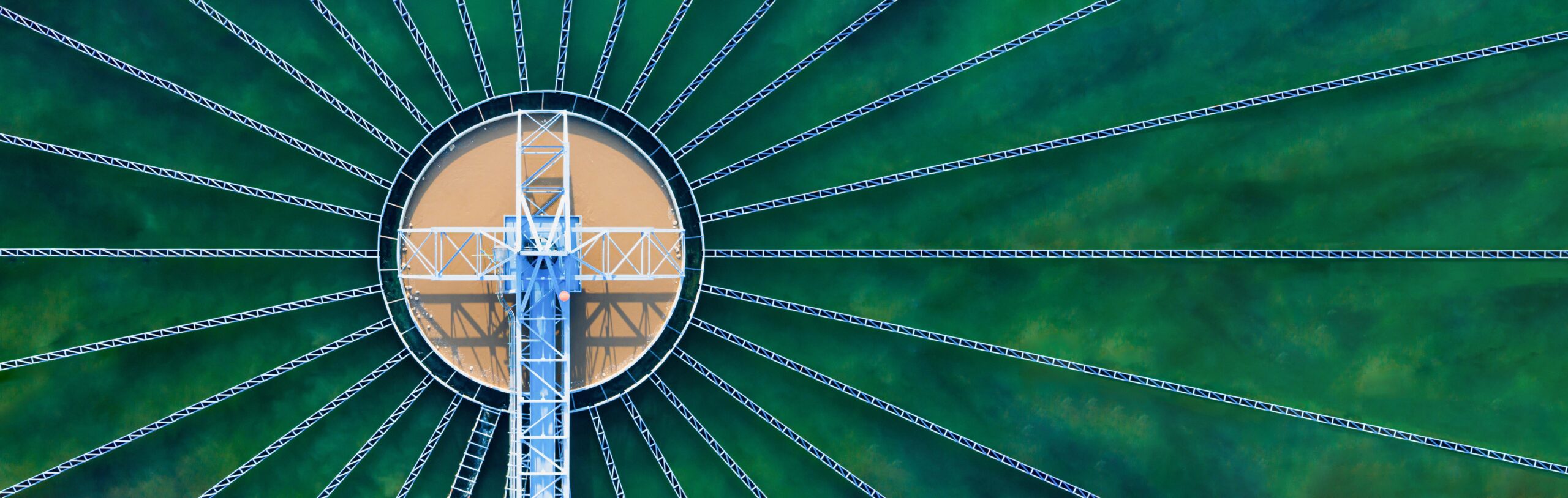 Aerial view of municipal wastewater infrastructure representing BreakEven+ cost intelligence for utilities